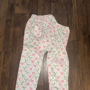 Mom and toddler matching pajama pants with Pink and Green Bow Pattern